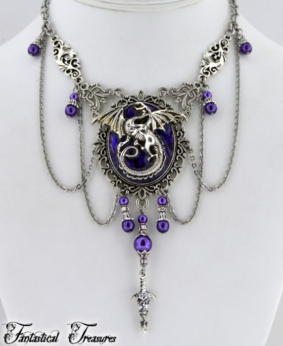 Purple fantasy dragon necklace on bust taken close up