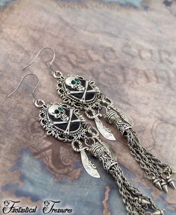 antique silver Unique Pirate Earrings on treasure map background with green eyes