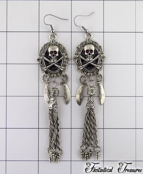 unique antique silver pirate earring with red eyes on grid